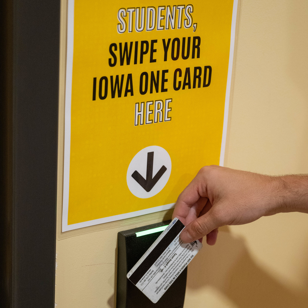 Hand scanning Iowa One card into AMAG system to enter the SDS Lounge
